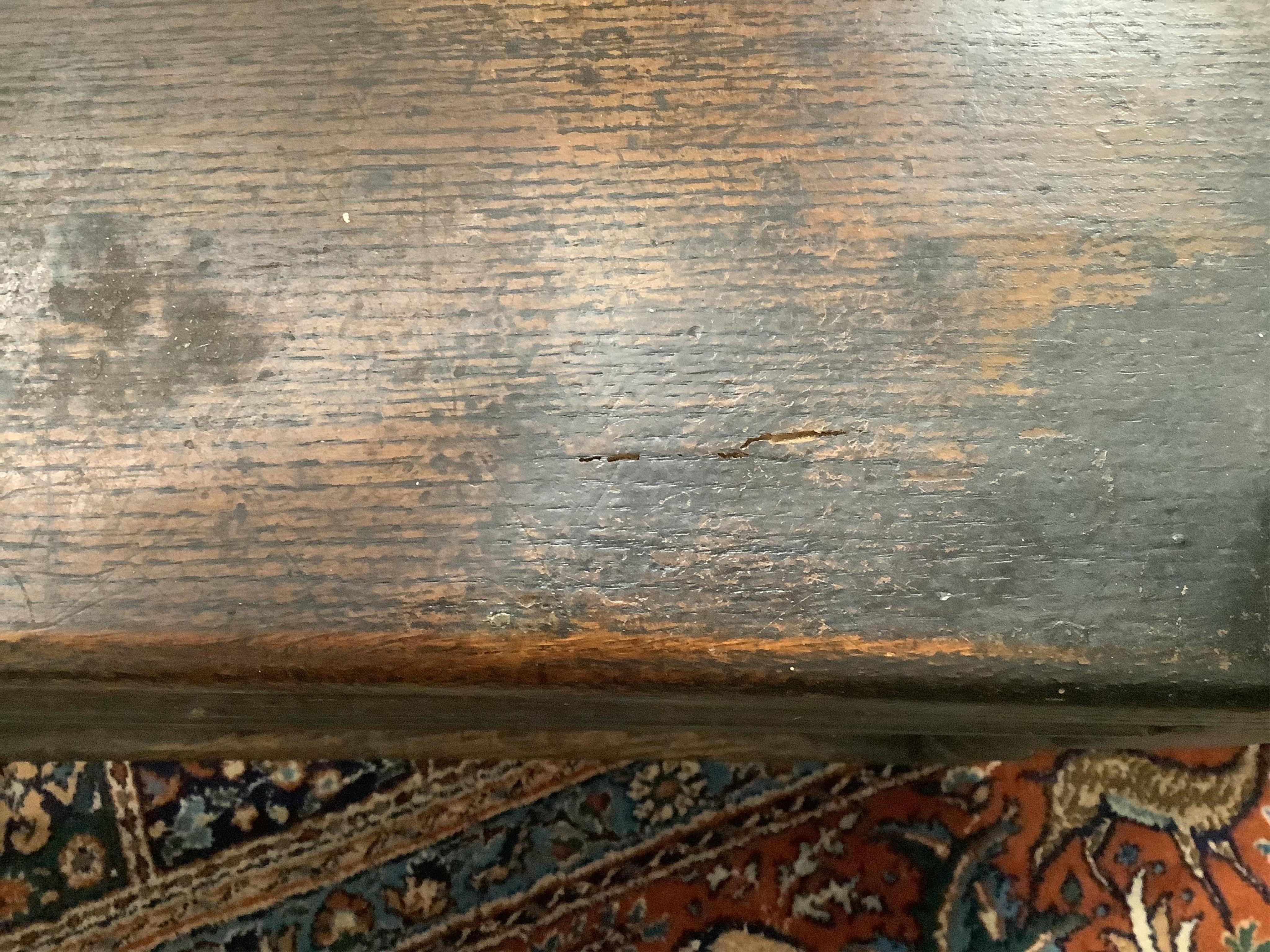 A 17th century oak wainscot type chair, width 61cm, depth 49cm, height 110cm. Condition - fair